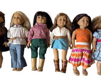 Six American Girl Dolls Stand
