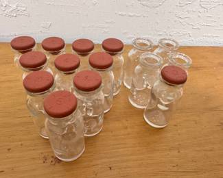 Cool vintage small glass bottles some with rubber lids