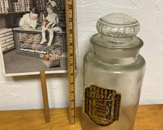 Antique Bunte Brothers candy jar and old summer advertising fan
