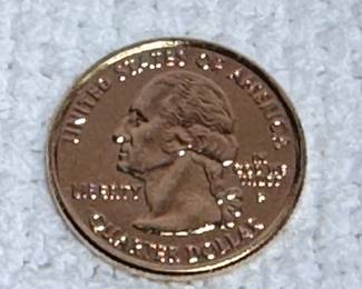 Gold plated quarter