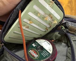Assortment of small fishing flies in appropriate pocket