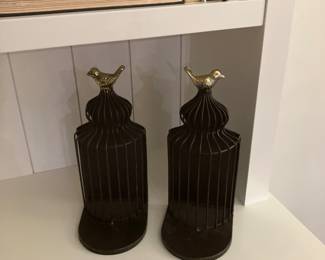 Decorative metal cage with bird toppers