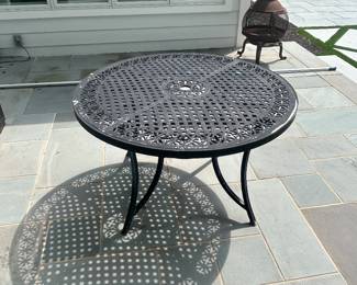 Round wrought iron table