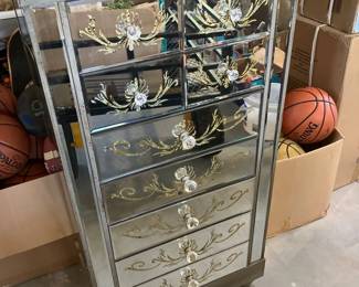 A lovely mirrored chest of draws 