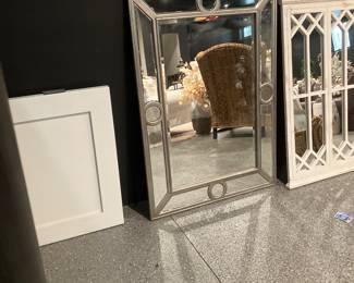 A large assortment of decorative mirrors and Architectural wood Decorative wall decor