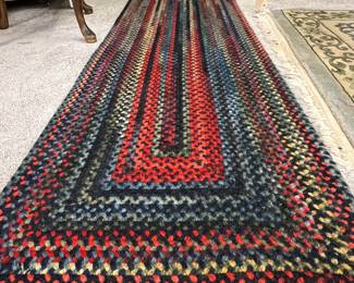 One of several braided rugs, runner