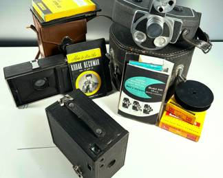 Vintage cameras for collectors!
Bell and Howell 16mm movie camera, 
a Kodak Recomar and the classic Brownie camera
