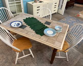 Tiled kitchen table and bow back chairs