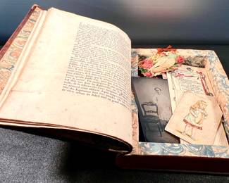 Vintage book “safe” with mementos.