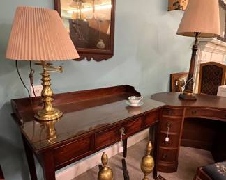 Single drawer writing desk, brass lamp, carved mirror and brass andirons