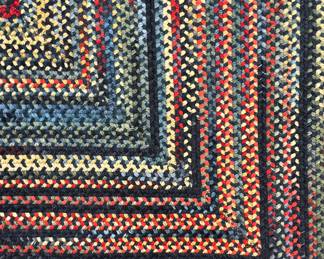 Several large square braided rugs plus scatter rug...vibrant colors.