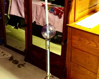 Antique weather vane with purple glass ball