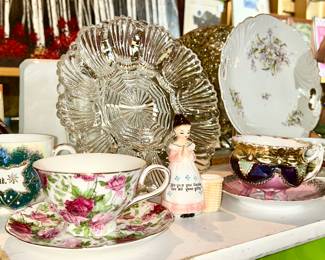 Antique cups & saucers, prayer lady toothpick holder, glass egg plate, etc.