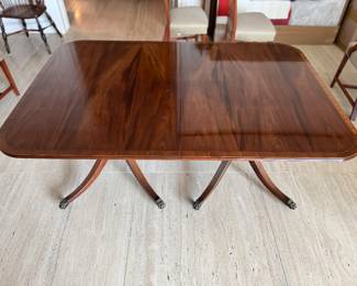 Antique Georgian-Style Satinwood Banded Double Pedestal Dining Table with Claw Feet. Measures 66" - 120" L (with four 13.5" Leaves) x 40" W x 28.5" H. Photo 3 of 7.