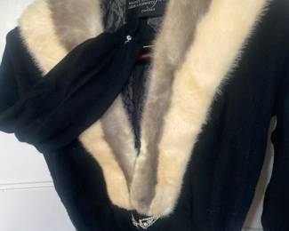 Vintage Black Cashmere Sweater with Silk Lining, Rhinestone Sleeve Buttons & Waist Clasp and Milk Collar. Size S/M. Photo 1 of 3.
