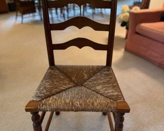 Pair of Antique Ladder Back Chair with Rush Seat and Pad Feet. Each Measures 19" W x 16" D with 18" Seat Height. Photo 1 of 3.