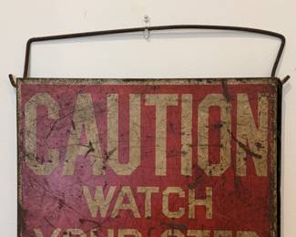 Caution Watch Your Step Sign.
