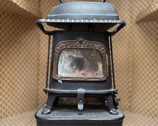 Vintage Florence Company Puritan Cast Iron Kerosene Stove (Sad Iron Stove) and Cast Iron Sad Iron. Photo 1 of 4.