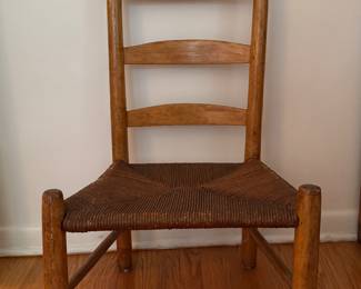 Antique Shaker Ladder Back Child's Chair with Rush Seat. Measures 19" W x 30" H with 12" Seat Height. Photo 1 of 3.