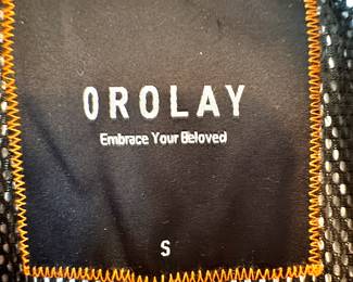 Orolay Women’s Winter Coat Tag Detail – Size S, Brand Label ‘Embrace Your Beloved’ Close-Up