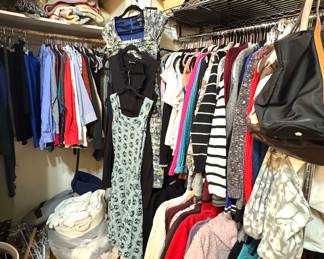 closet filled with size small petite women's clothing