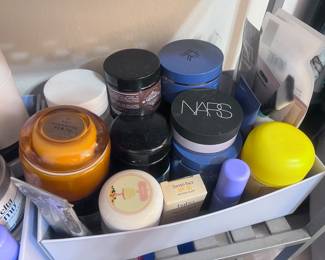 Bin filled with both drugstore and designer skincare products (New in box, some slightly used )