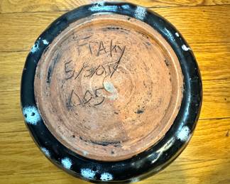 Hand made pottery signed