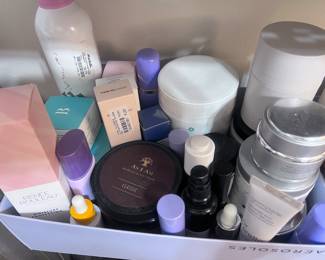 Bin filled with both drugstore and designer skincare products (New in box, some slightly used )