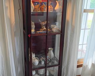 curio cabinet with goodies 