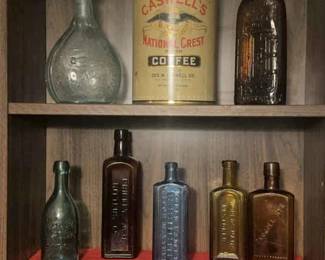Collection Of Cure Bottles Coffee Tin