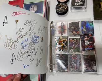living room middle table. signed basketball cards