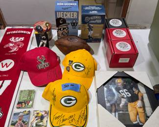 living room NE side. signed hats, game balls, bobbleheads