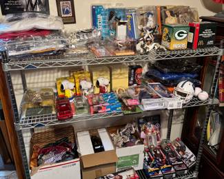first floor middle bedroom. jerseys, snoopy, sports, marvel