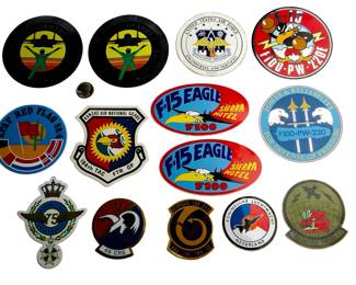 Collection of 12 Vintage Military Aircraft Stickers - F-15 Eagle, USAF Engineering, Red Flag 84, Kansas Air National Guard, Royal Netherlands Air Force, and More