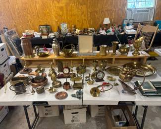 Table of vintage brass and copper decor 