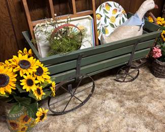 Great wood wagon with iron wheels.  Tong is missing but attach mechanism is there