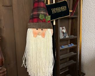 We love our Christmas Decor. Hanging Santa with wonderful beard
