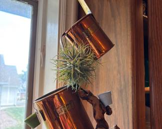 Love this copper hanging Laddles