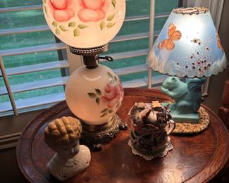 Love these lamps.  Hand Painted double globe that has been electrified, Van Briggle Pottery Figural Squirrel lamp with original shade, Elizabethen Doll head. Antique Round table