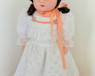 Antique doll "Nelle", made in Germany (approx. 150 years old) with 1987 newspaper clipping describing the doll's history