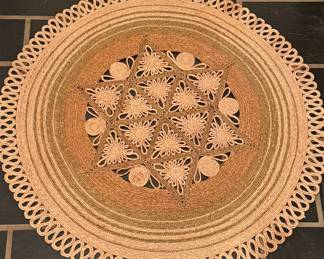 Woven sisal area rug (approx. 3' round)