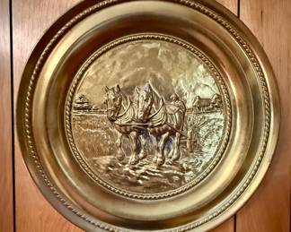Vintage brass wall plate with horses