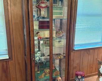 Tall curio cabinet