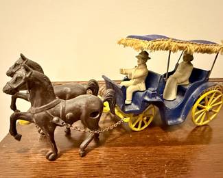 Vintage cast iron horse drawn surrey