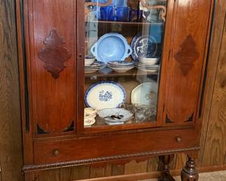 Jacobean Revival style china display cabinet