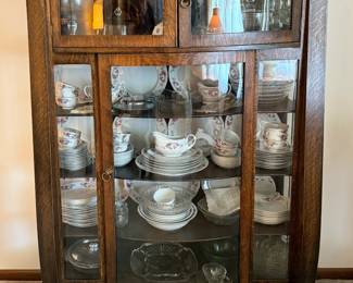 Antique bow glass tiger oak china cabinet