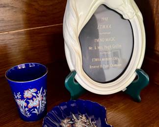 Ceramic horse frame with cobalt blue porcelain tumbler and seashell dish