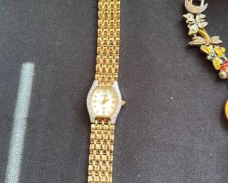 Women's Gold Tone Watch with Rhinestone Bezel 