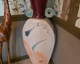 4 foot tall ceramic vase.