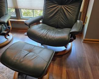 Ekornes Stressless green leather recliner with ottoman. 